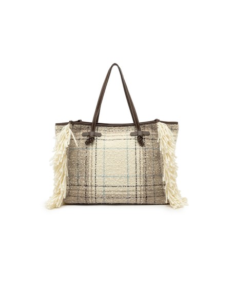 Accessori shopping firenze è realizzata in tessuto effetto plaid arricchito da frange di lana e profili in pelle